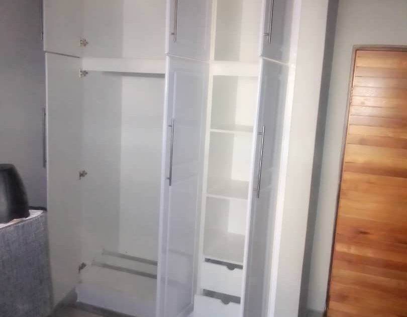 Built-in cupboard with internal drawers fitted in a Cape Town bedroom